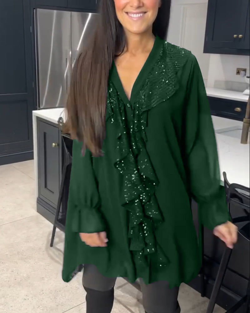 Bluse med volanger og elegant stil