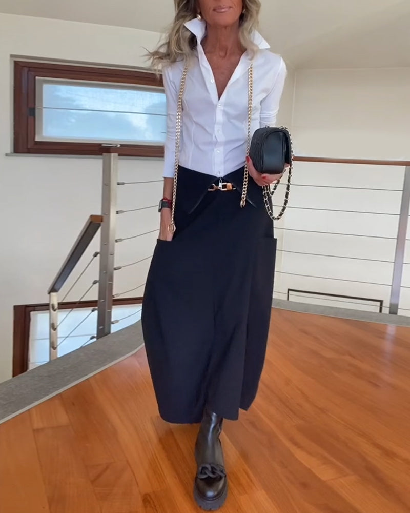 Fasjonabelt ensfarget skjørt med glidelås og lomme