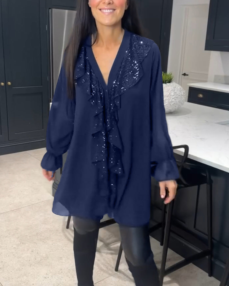 Bluse med volanger og elegant stil