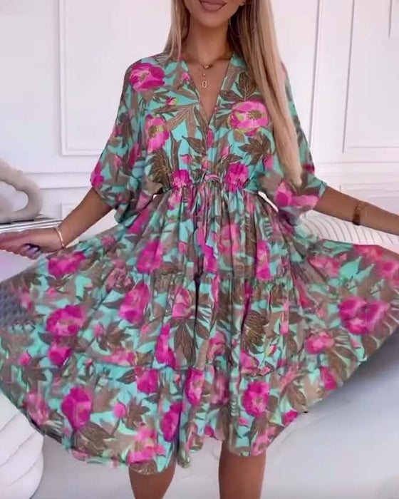 Elegant kjole med snøring og blomsterprint