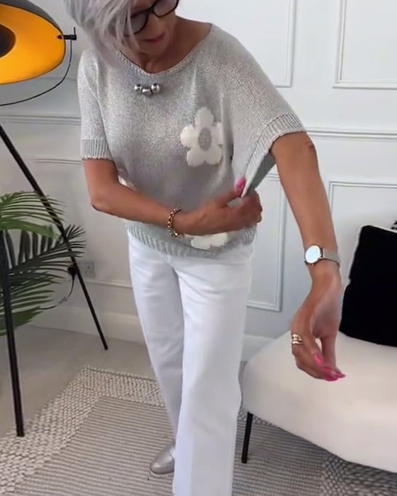 Slank blomstergenser med rund hals