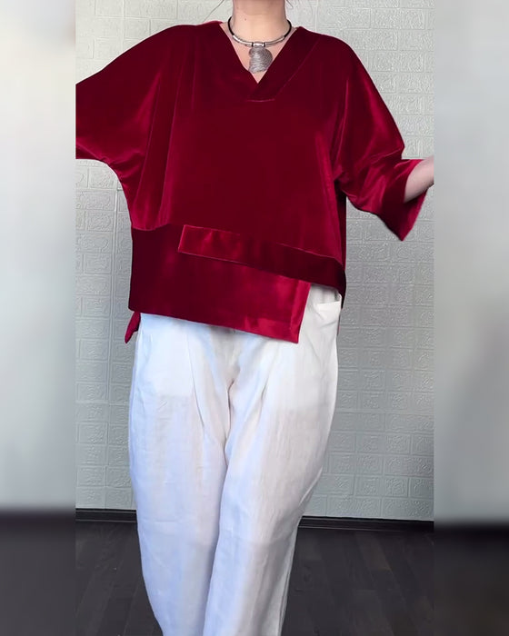 Topp Med V-Hals Och Asymmetrisk Nederkant