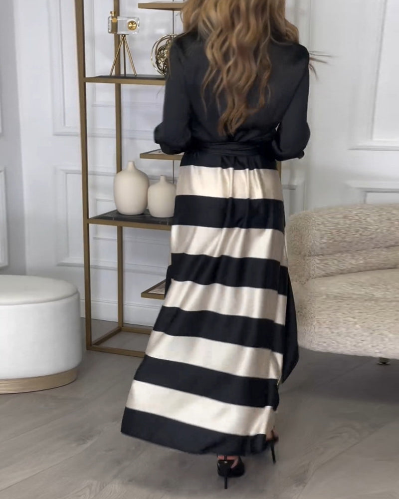 Elegant kjole med striper og jakkeslag