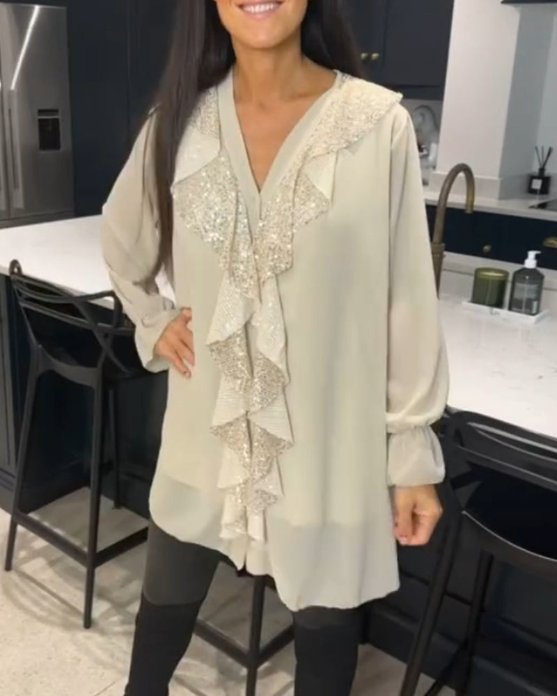 Bluse med volanger og elegant stil
