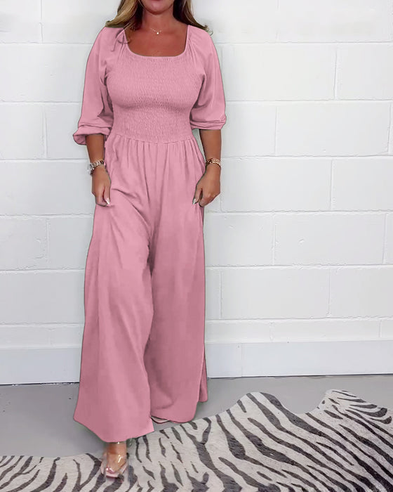 Ensfarget jumpsuit med firkantet hals