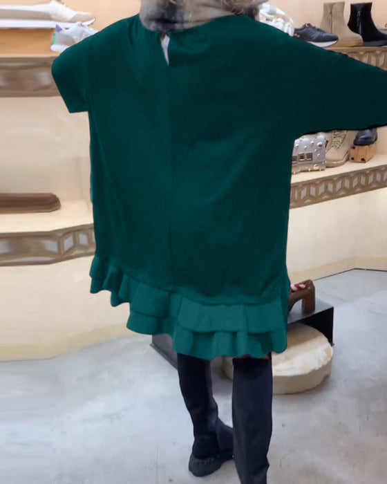 Kjole med elegant silhuett og lange ermer