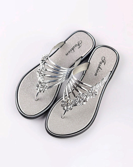 Fasjonable flip-flops med blomster og rhinestone