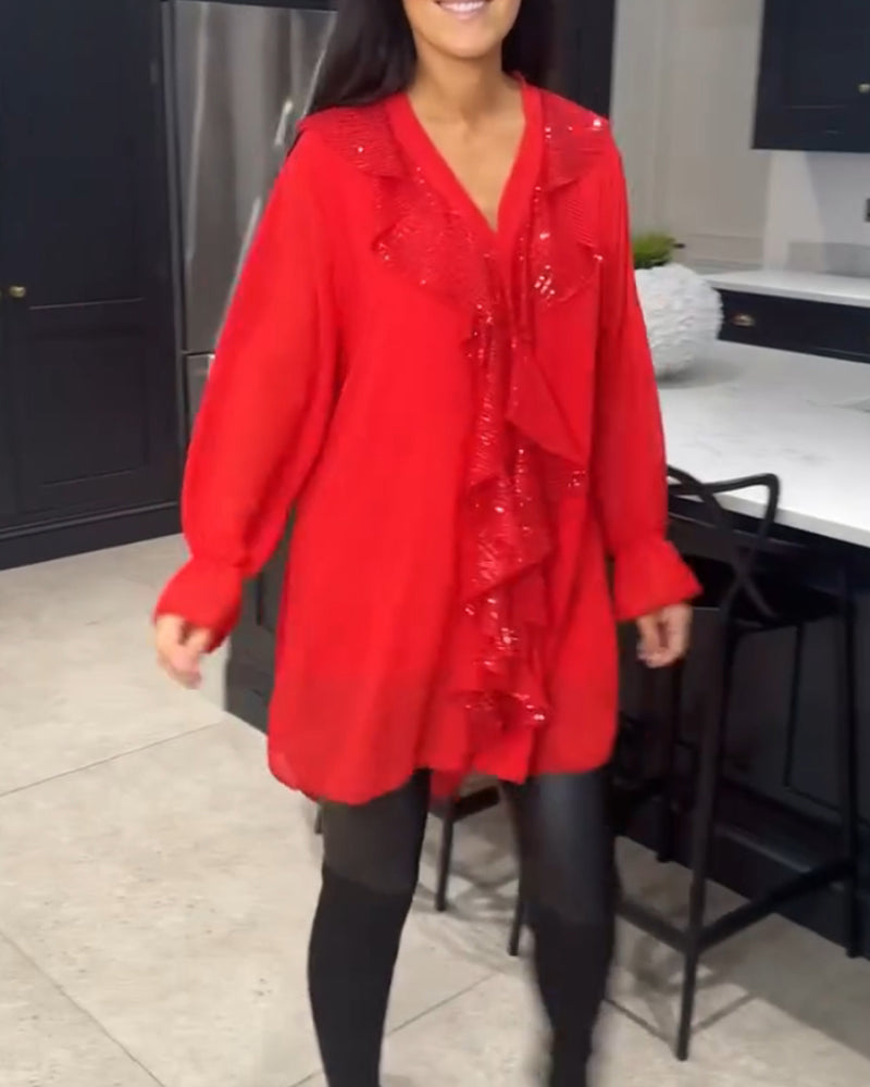 Bluse med volanger og elegant stil