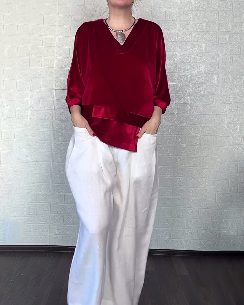 Topp Med V-Hals Och Asymmetrisk Nederkant