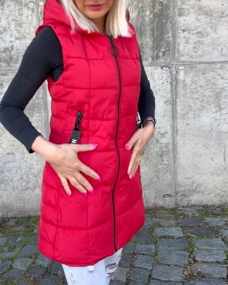 Ermeløs polstret jakke med hette med glidelås