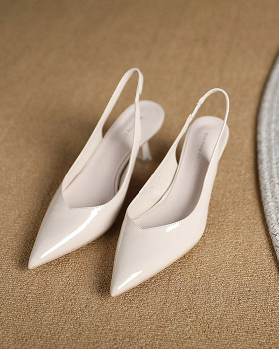 Ensfarget temperament høye hæler med spiss tå