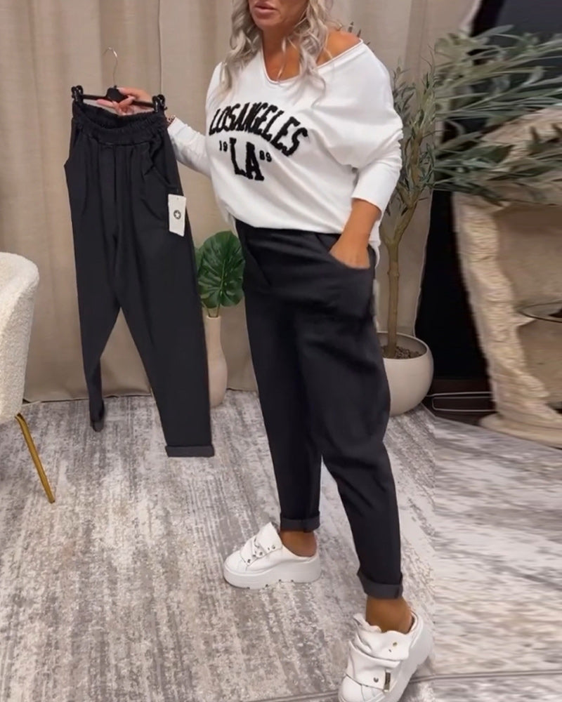 Uformell genser med v-hals med bokstavtrykk