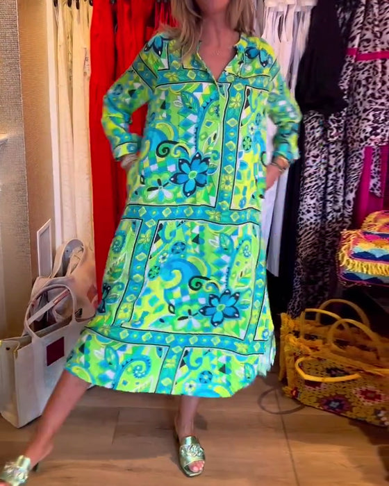 Kjoler med løs passform og trykk og lommer