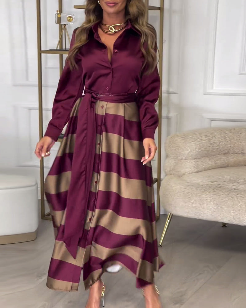 Elegant kjole med striper og jakkeslag