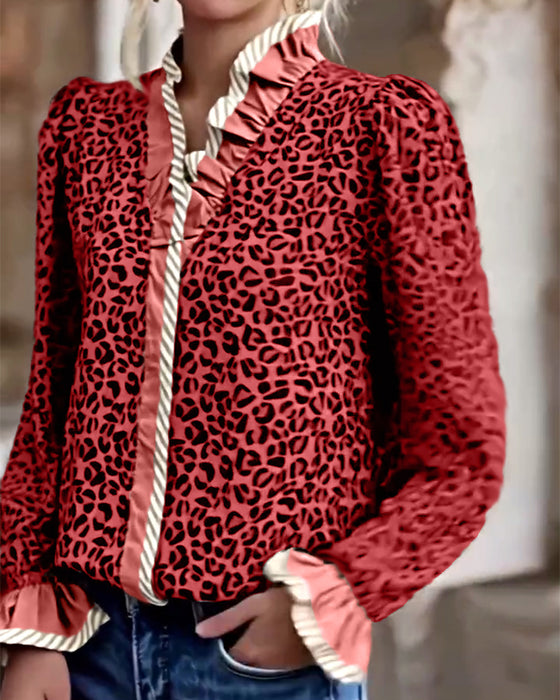 Bluse med avslappet leopardprint og lange ermer