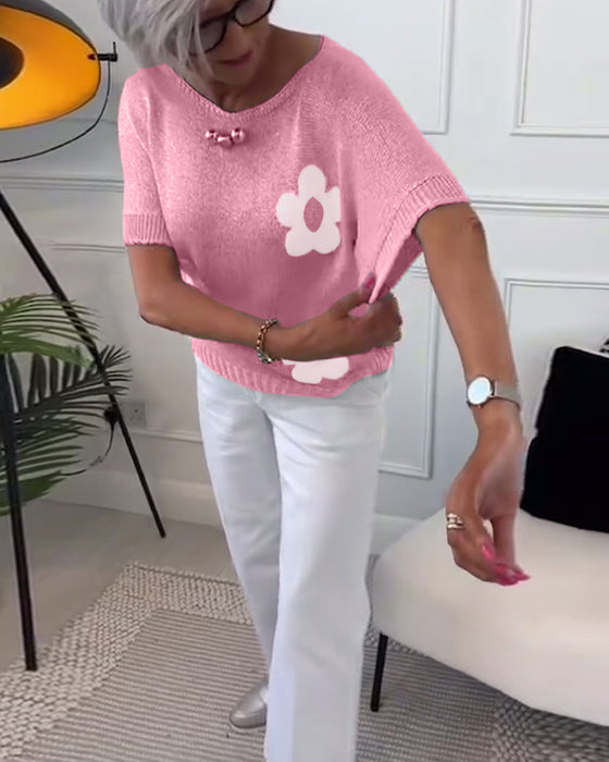 Slank blomstergenser med rund hals