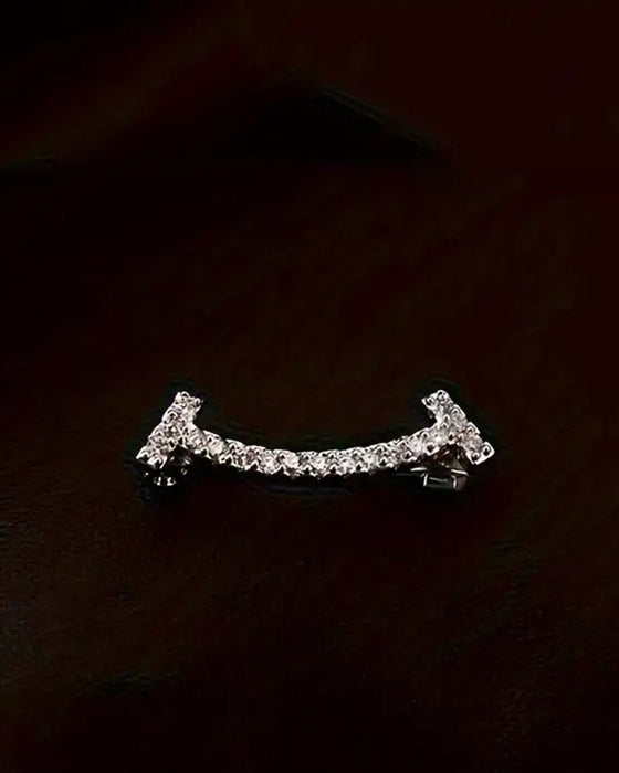 Søt smilefjesbrosje