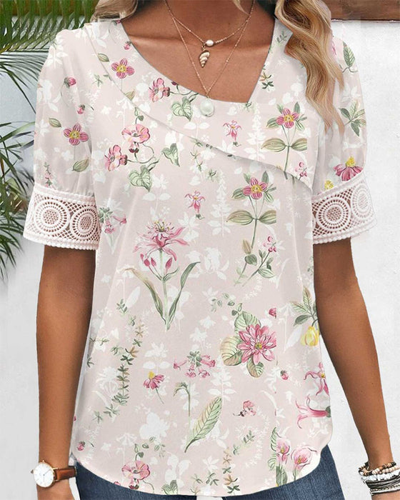 Topp med korte ermer og blomstermønster