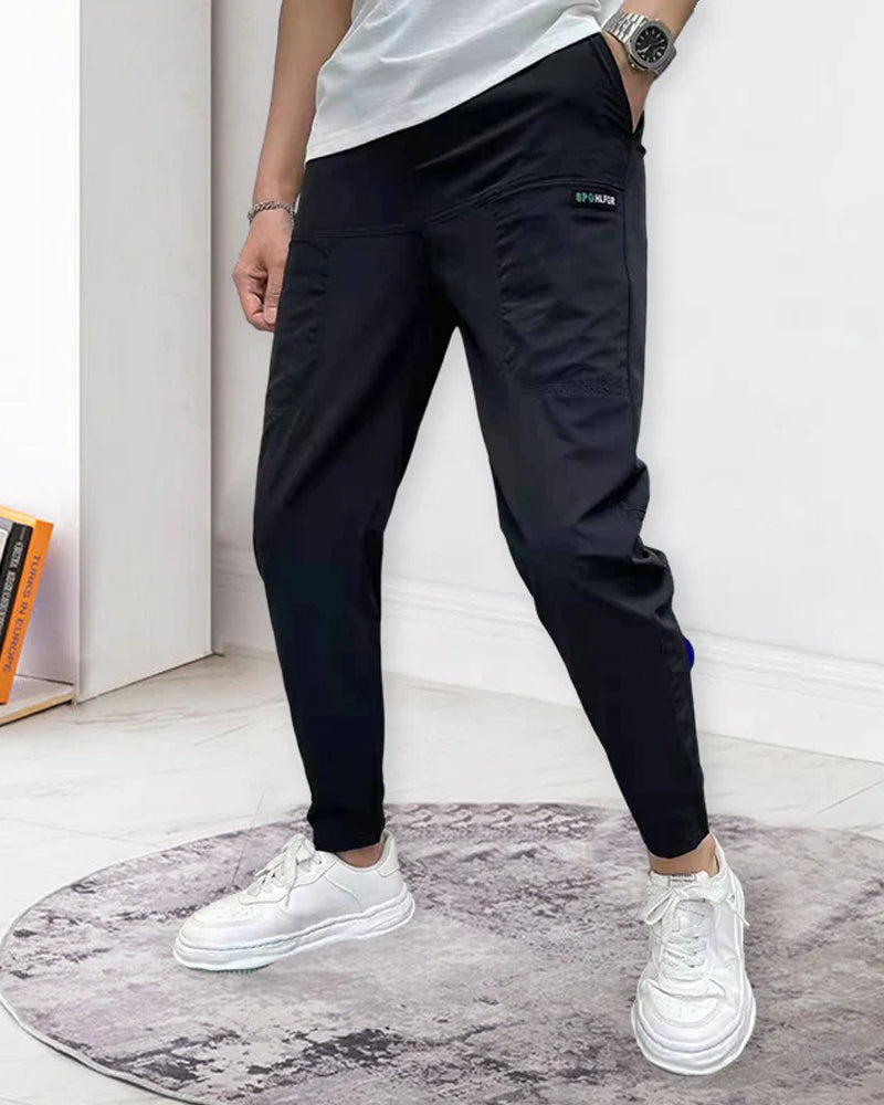 Høystrekkbare skinny cargobukser med flere lommer for menn