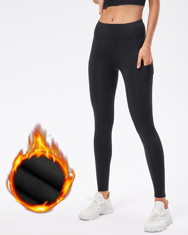 Ensfargede leggings med fleecelommer