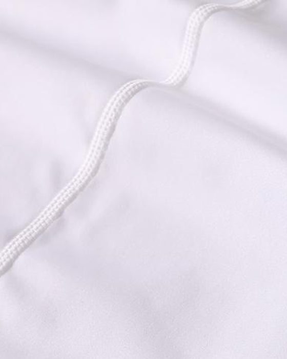 Ensfarget vest med tett passform for menn