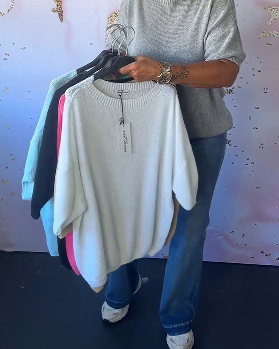 Uformell løs ensfarget genser med rund hals