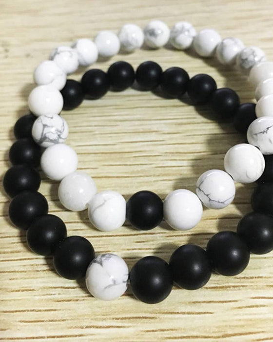 Svart og hvitt perlevevd par armbåndsett