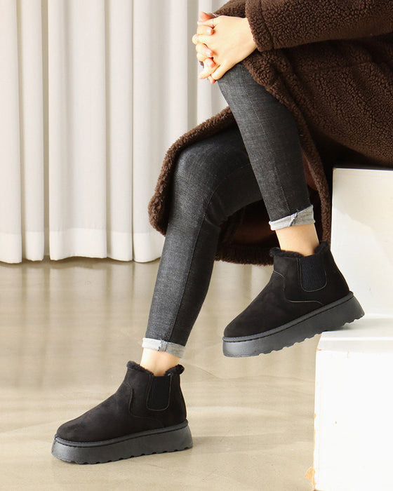 Ensfargede snøstøvler med tykk såler