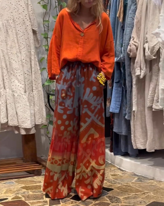 Løse bukser med brede ben med trykt lomme