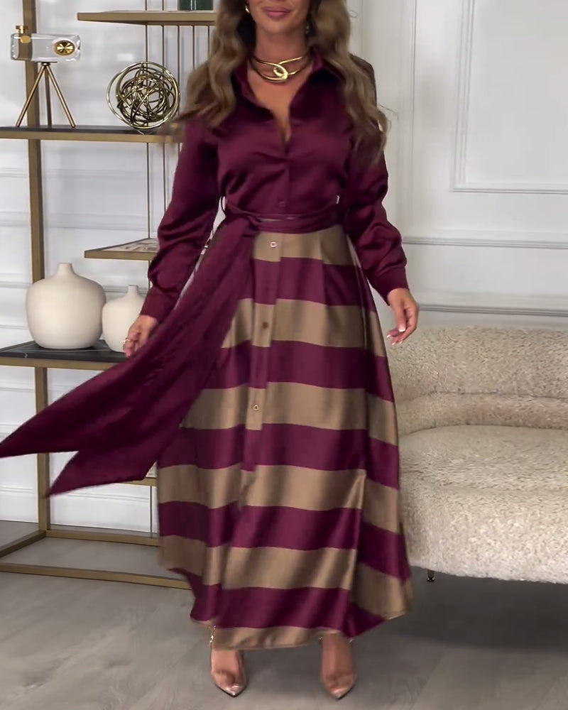 Elegant kjole med striper og jakkeslag