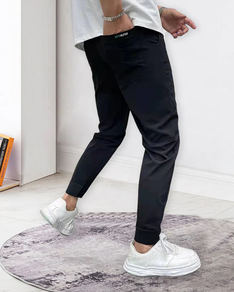Høystrekkbare skinny cargobukser med flere lommer for menn