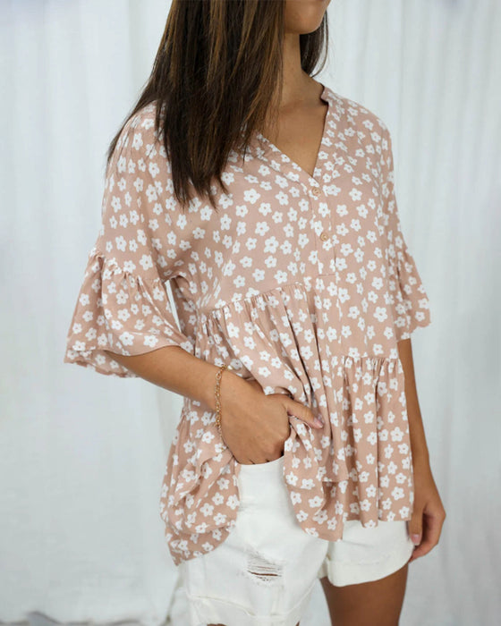 Blomstret bluse med V-hals klokkeermer