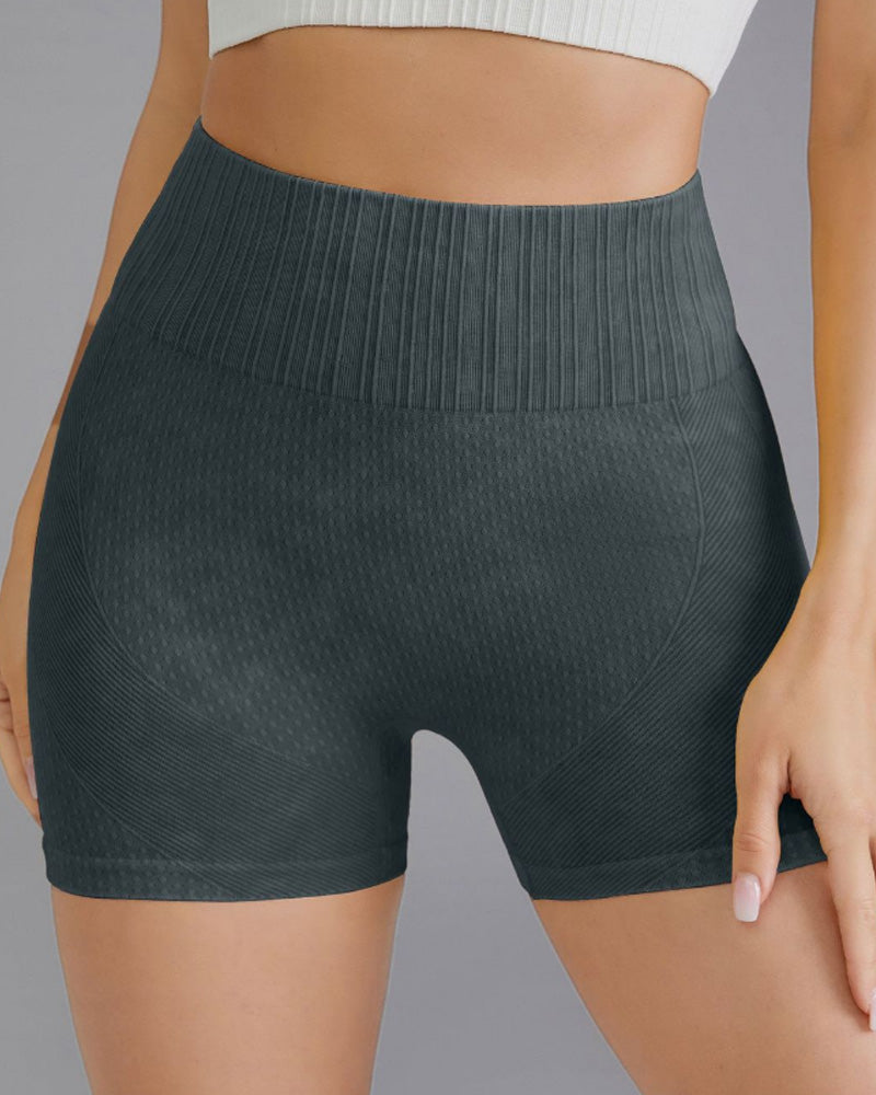 Enkel ensfarget hofteshorts med høy midje