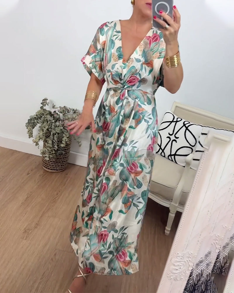 Elegant kjole med v-hals med botanisk trykk