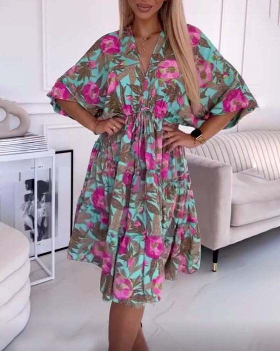 Elegant kjole med snøring og blomsterprint