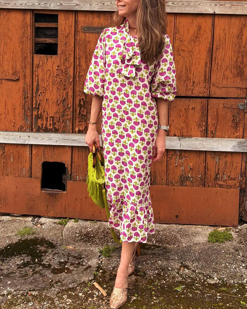 Elegant kjole med puffermer