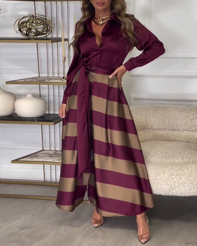 Elegant kjole med striper og jakkeslag