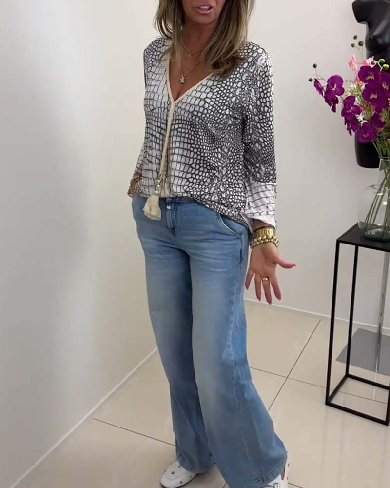 Bluse med blomstermønster og snor