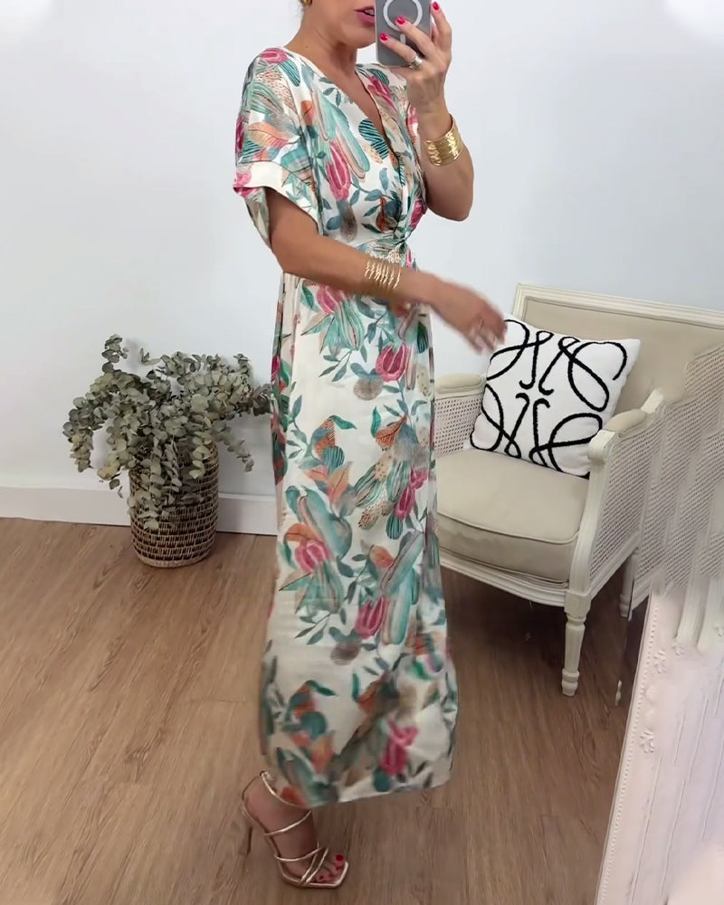 Elegant kjole med v-hals med botanisk trykk