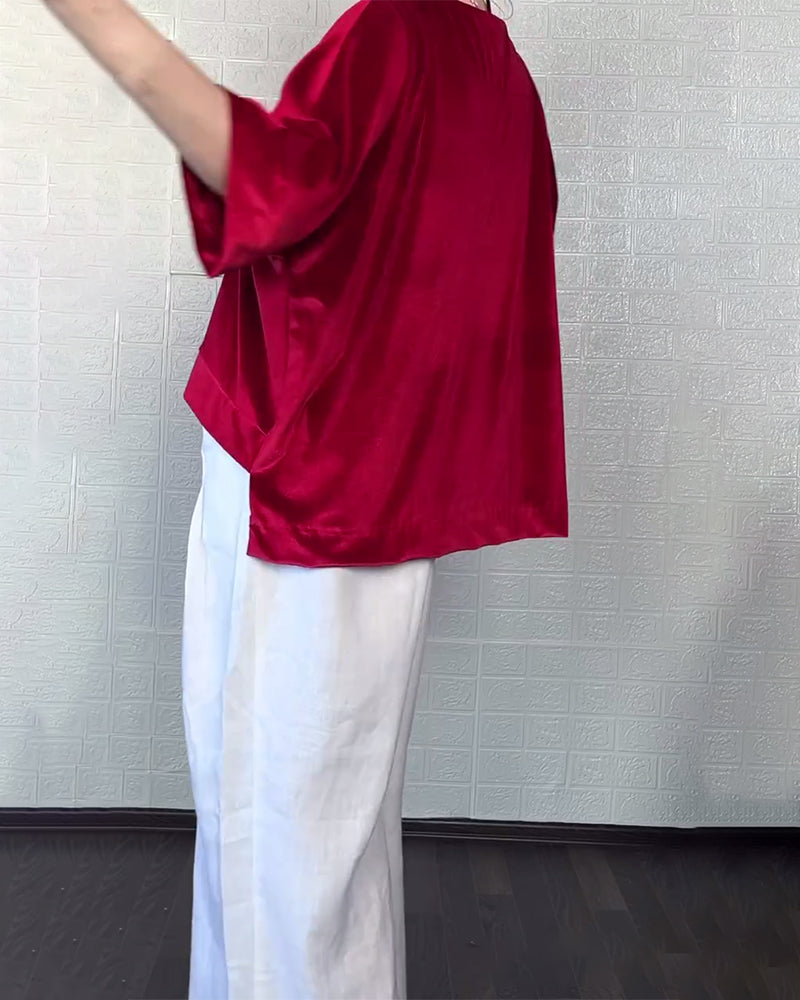 Topp Med V-Hals Och Asymmetrisk Nederkant