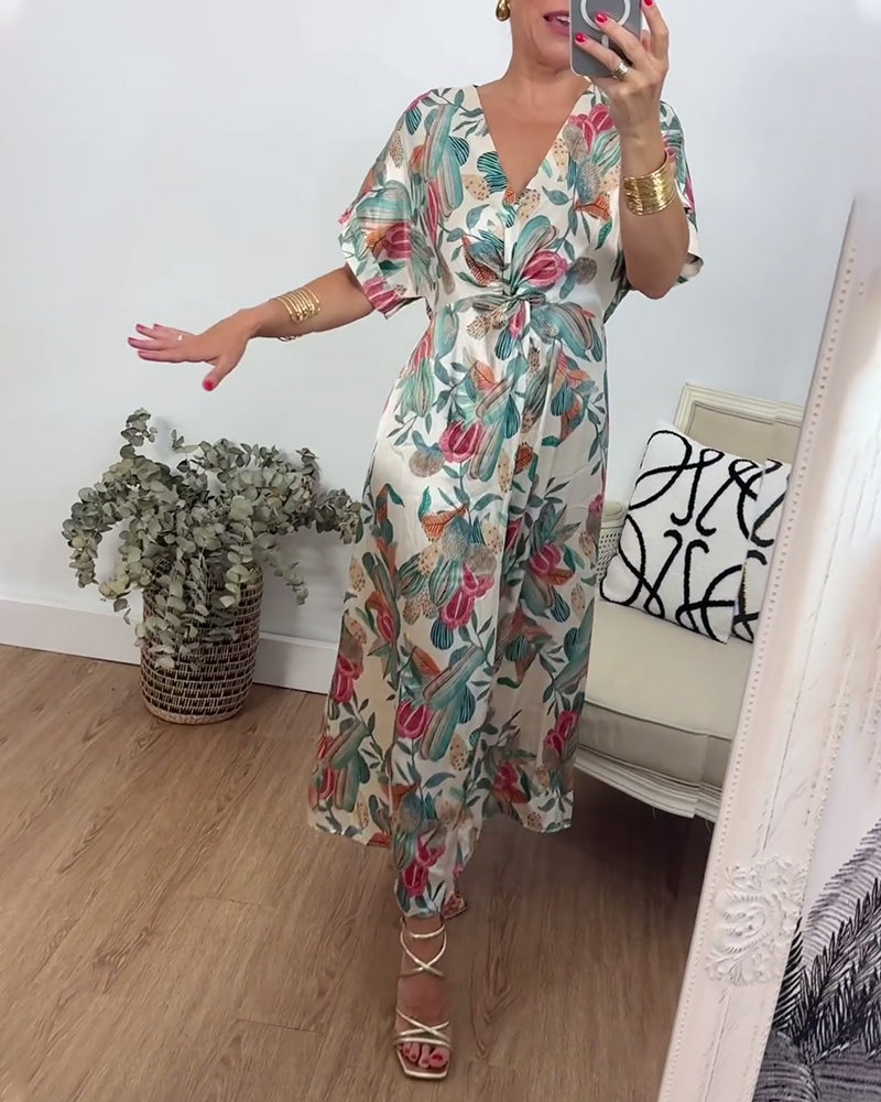 Elegant kjole med v-hals med botanisk trykk