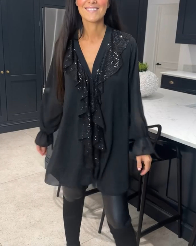 Bluse med volanger og elegant stil