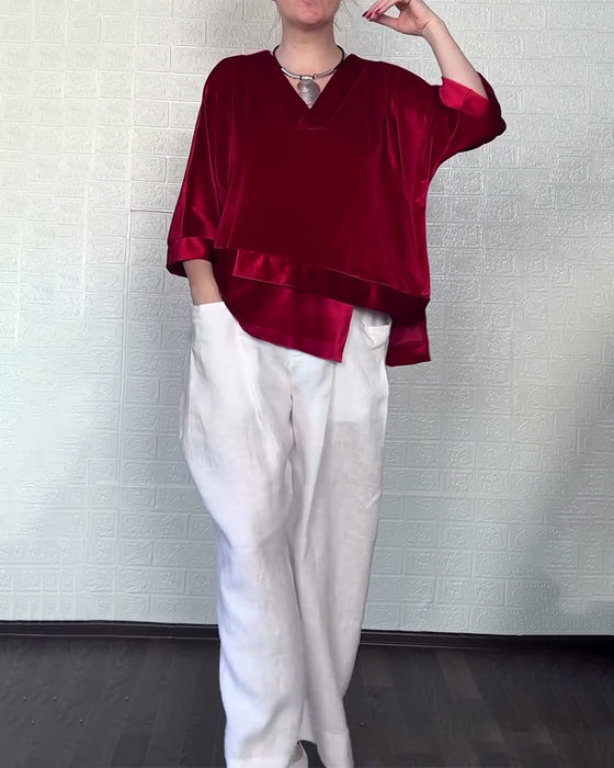 Topp Med V-Hals Och Asymmetrisk Nederkant