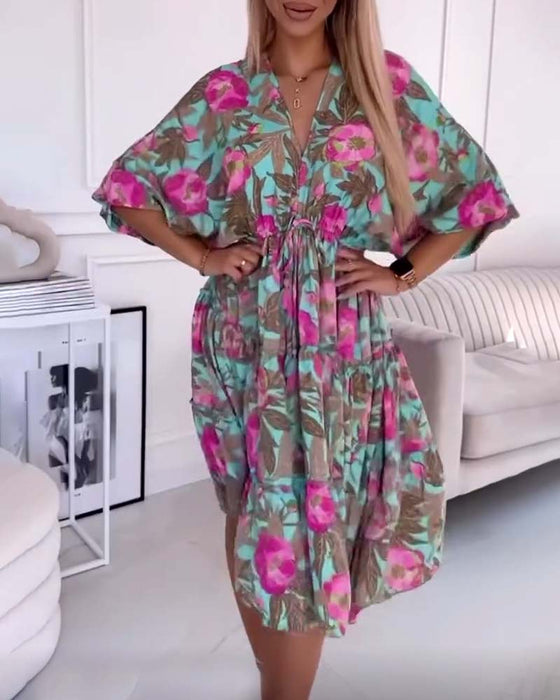 Elegant kjole med snøring og blomsterprint