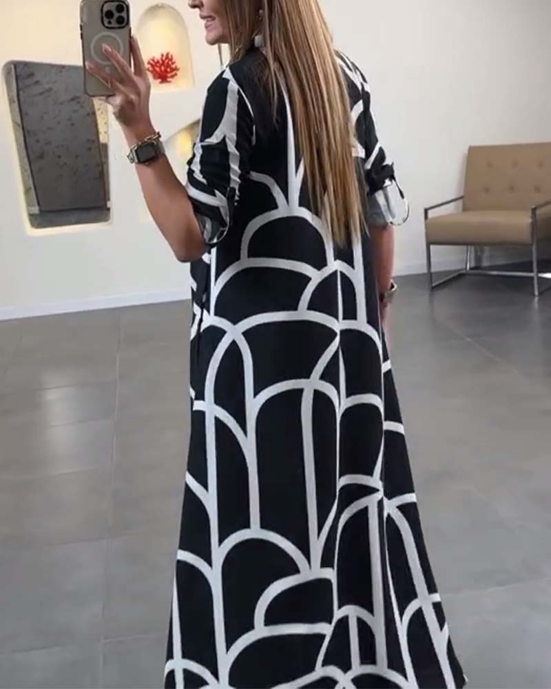 Lang kjole i jakkeslag med kontrasttrykk