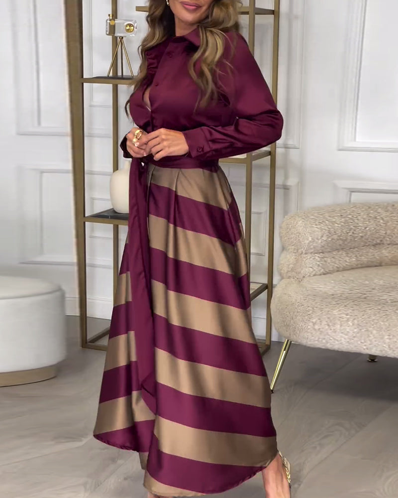 Elegant kjole med striper og jakkeslag