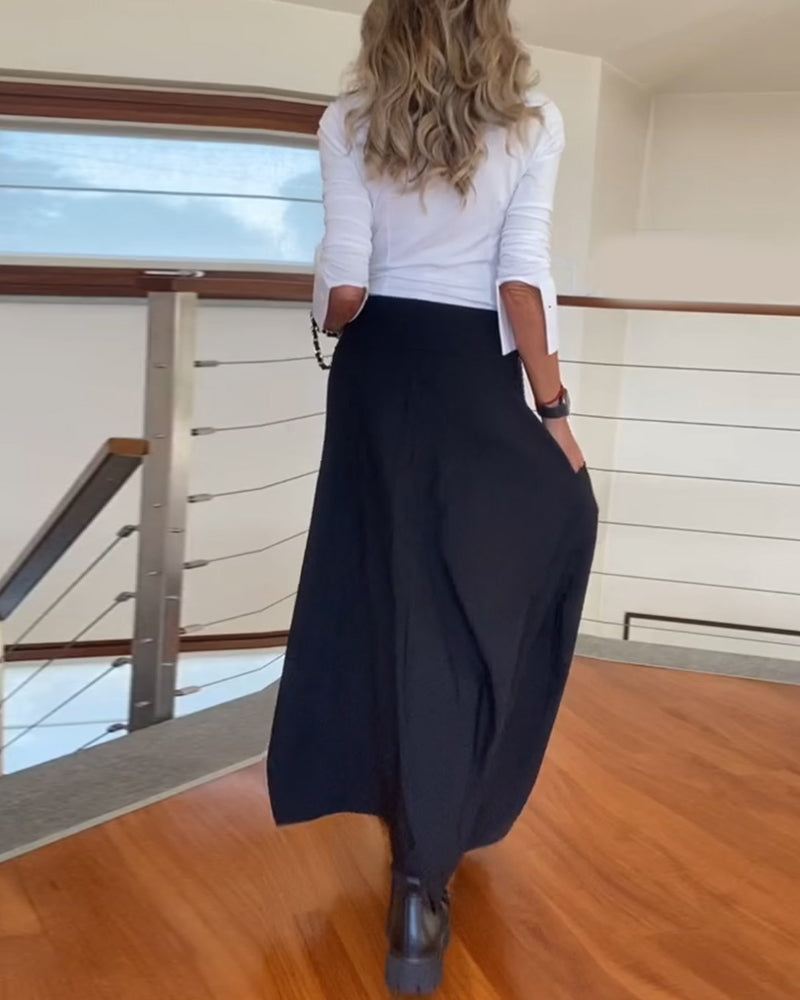 Fasjonabelt ensfarget skjørt med glidelås og lomme