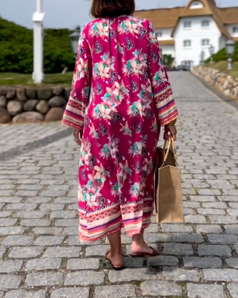 Langermet løs kjole med v-hals