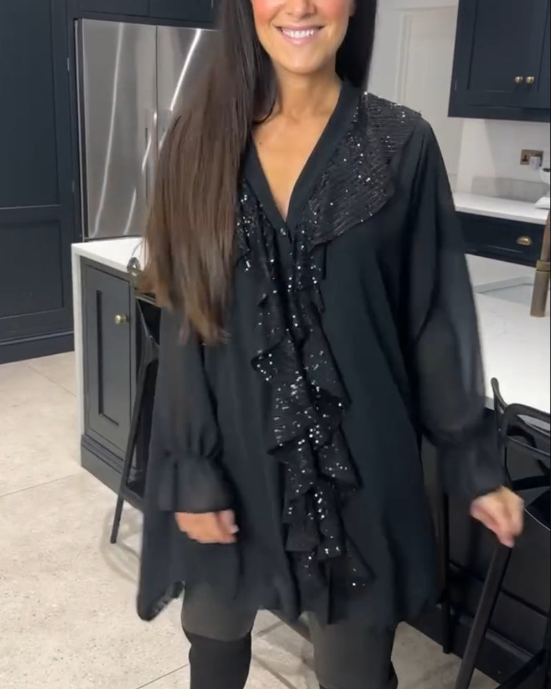 Bluse med volanger og elegant stil