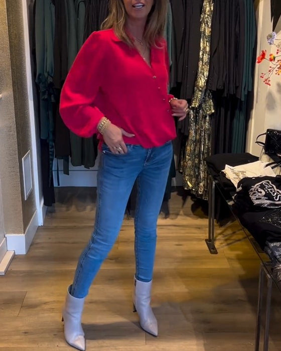 Elegant bluse med lanterneermer